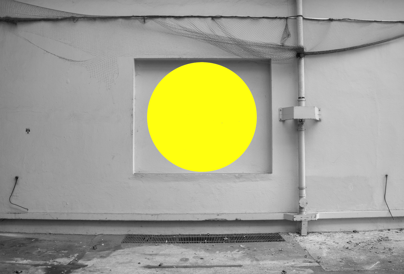 Ein gelber Kreis ist an eine Wand auf dem Franck-Areal gemalt.