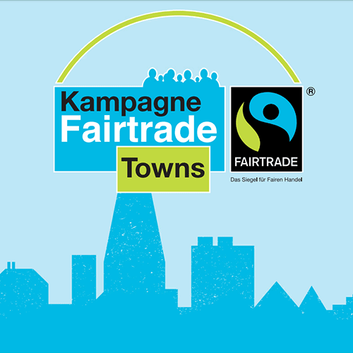 Logo Fairtrade towns. Stilisierte Stadt die mit den Worten Kampagne Fairtrade Towns überschrieben ist ist