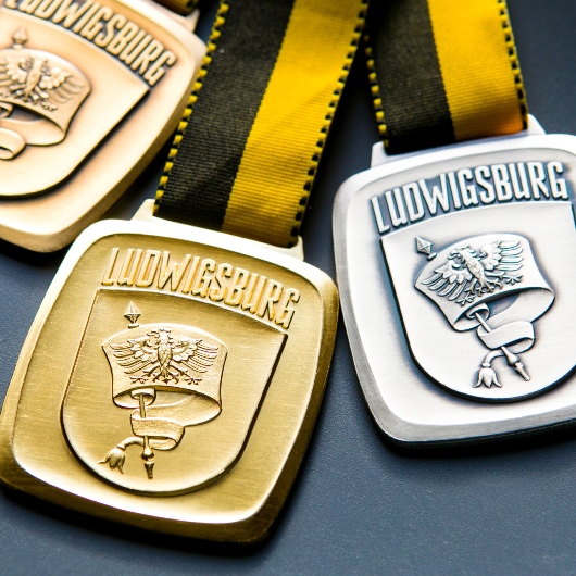 Bronze-, Silber- und Gold-Medaille